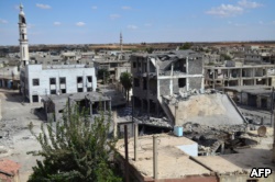 Сирия, разрушенный бомбежками центр Талбисы, северного пригорода Хомса